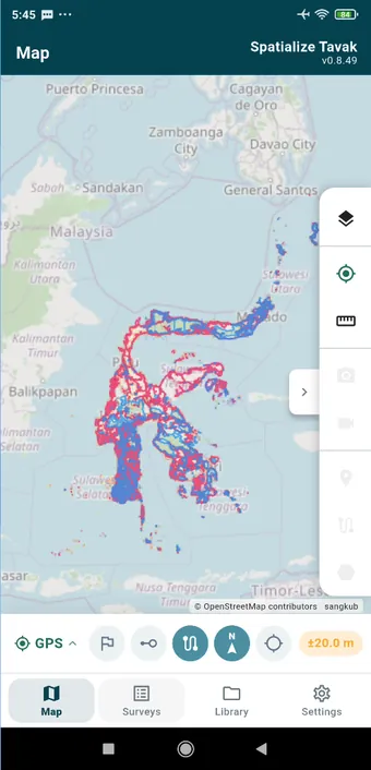 OpenStreetMap extracts for Sulawesi imported as GeoPackages: buildings, roads and land use, drawn over the whole island.