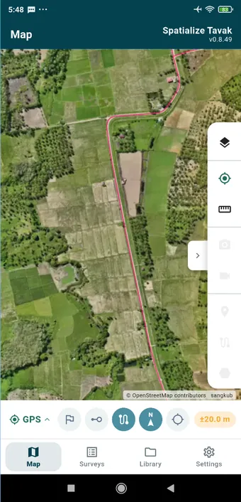 An orthophoto MBTiles pack drawn as the basemap, with the imported road layer on top.